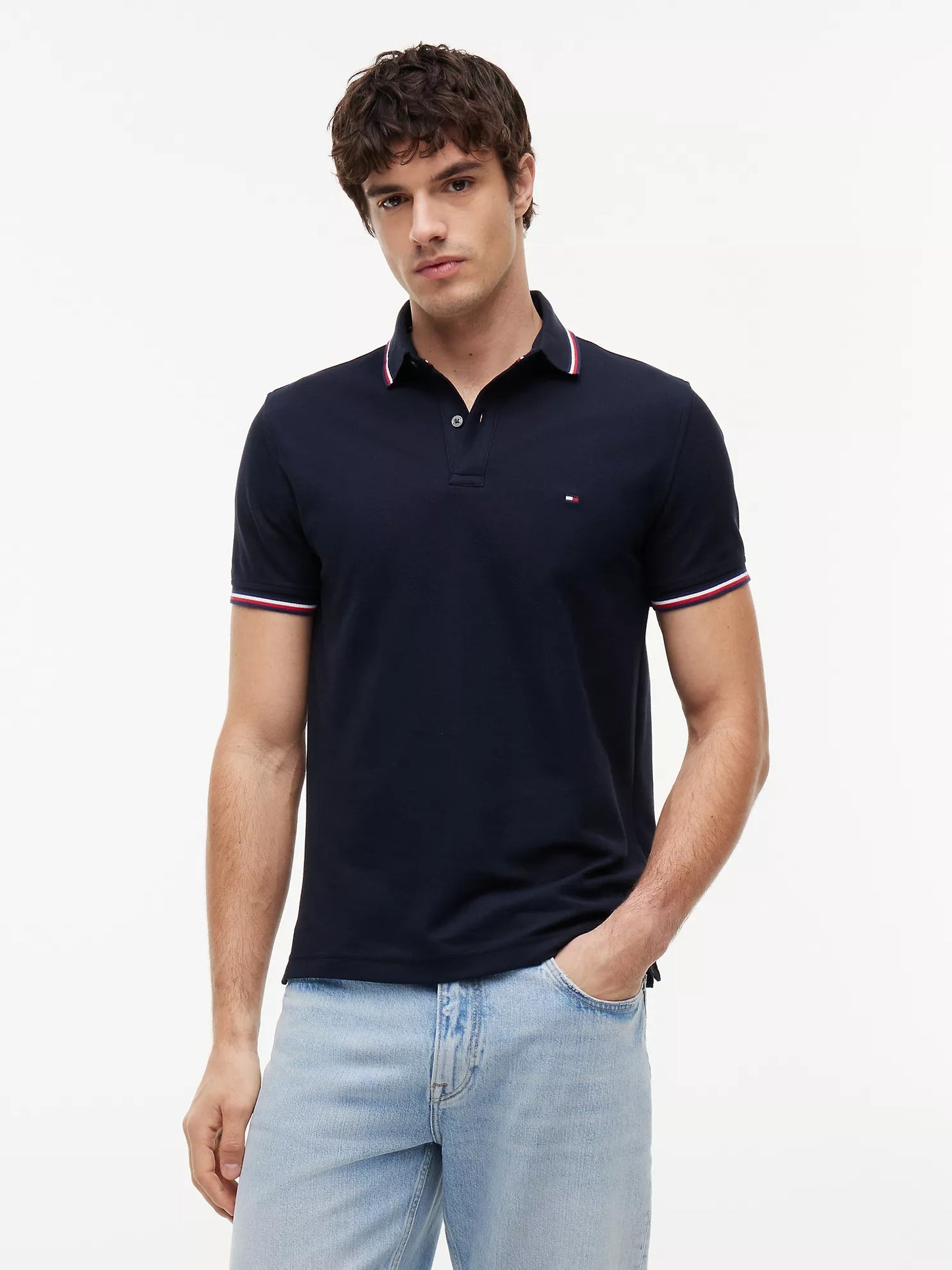 POLO TOMMY WICKING DE CORTE REGULAR