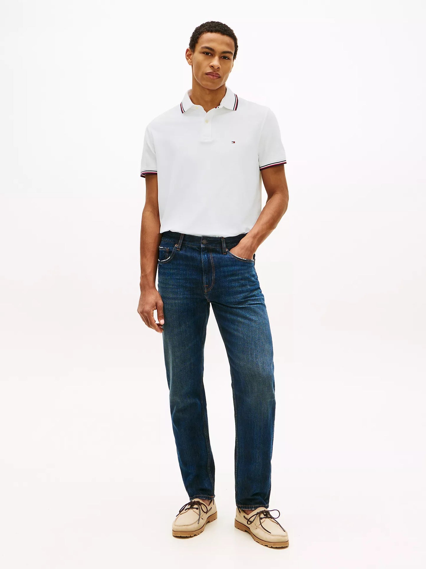 POLO TOMMY WICKING DE CORTE REGULAR